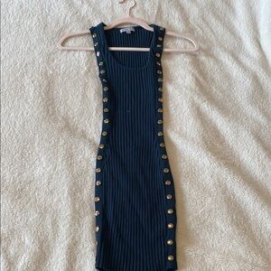 Elegant Black Sleeveless Dress with Gold Accents